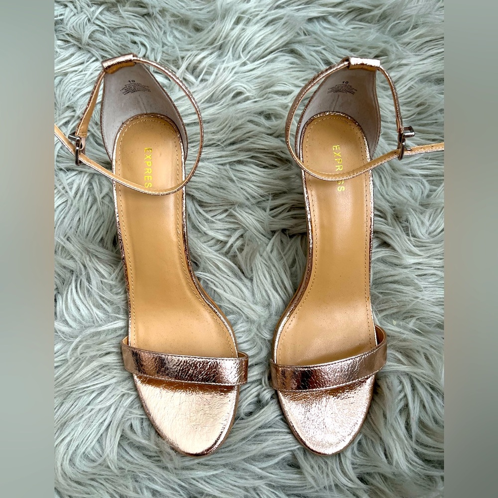 Express rose gold color with small heel shoes. Size 10 worn once.